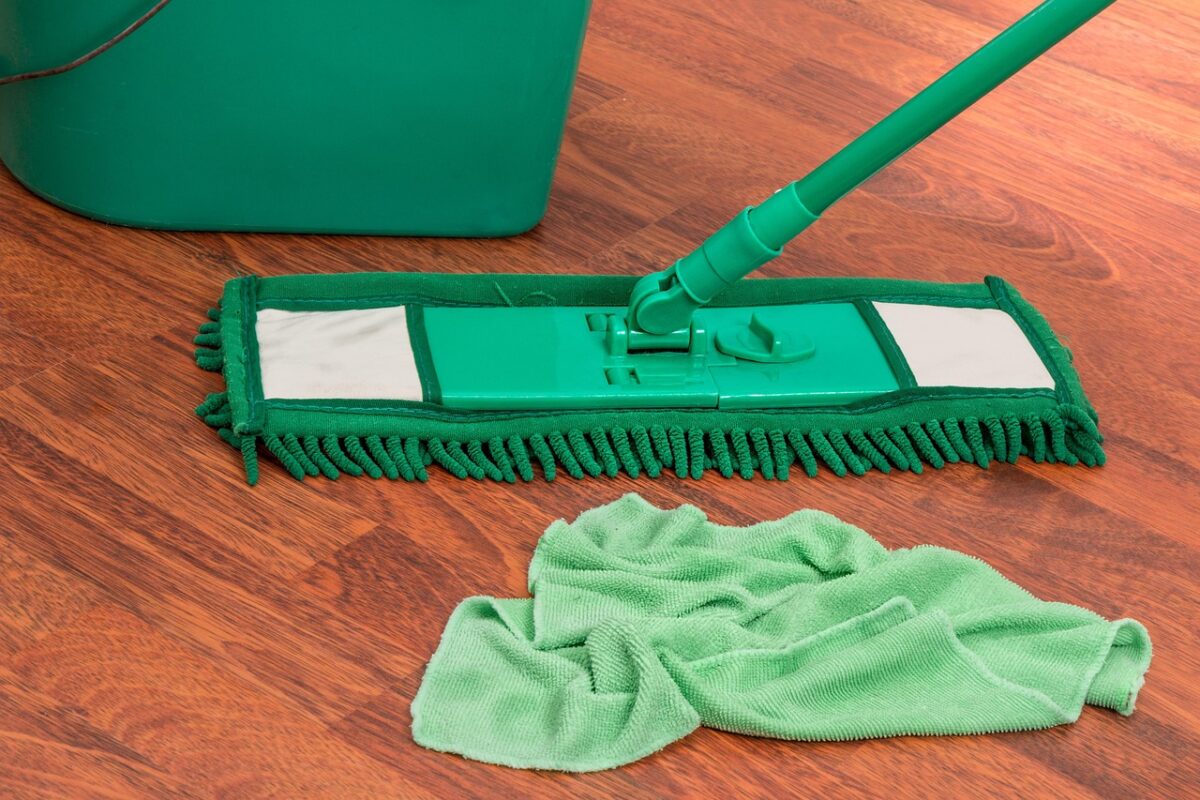 A commercial mop bucket with a wringer